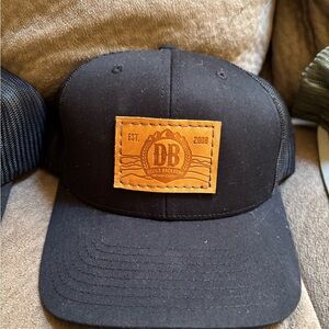 Black Trucker Hat with Leather Patch